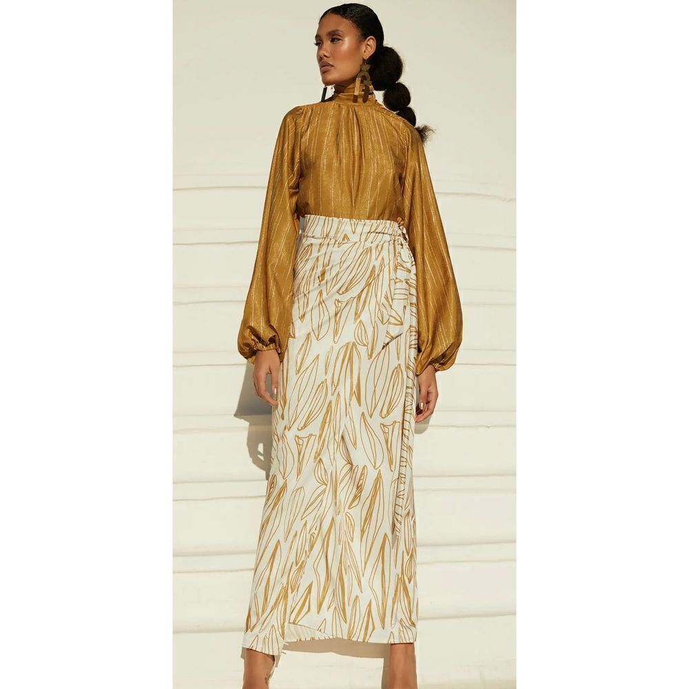 Diarrablu Eva Mock Neck Top